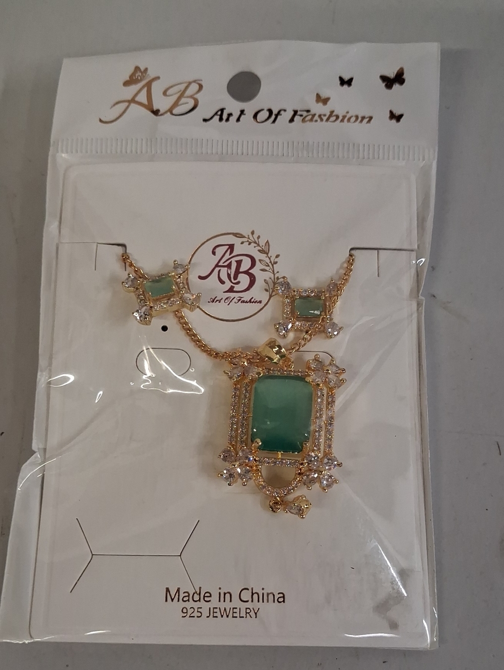 NWT Gold Necklace Set with Green Gemstone Pendant